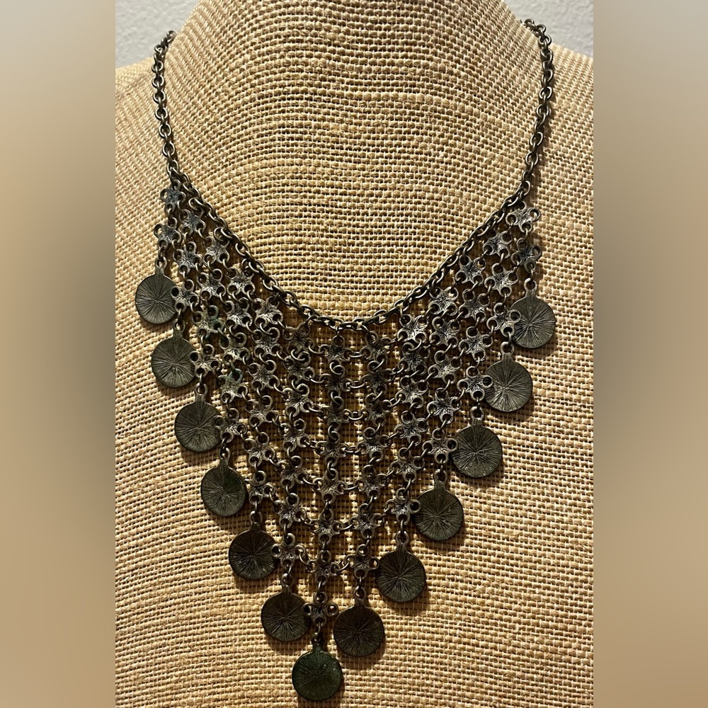 Antique style brushed silver necklace.